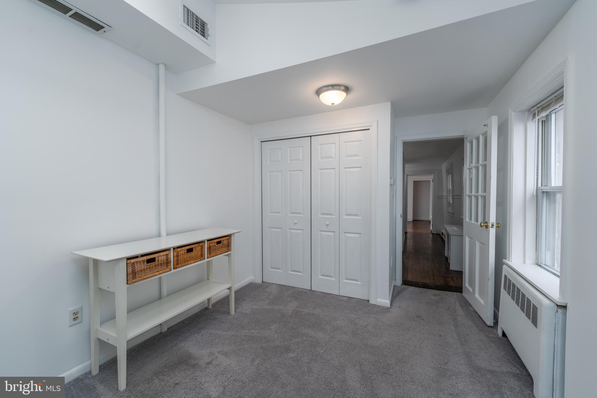 1153 Riverside Avenue Baltimore, MD 21230 - Photo 25 of 35 a room with furniture and white doors