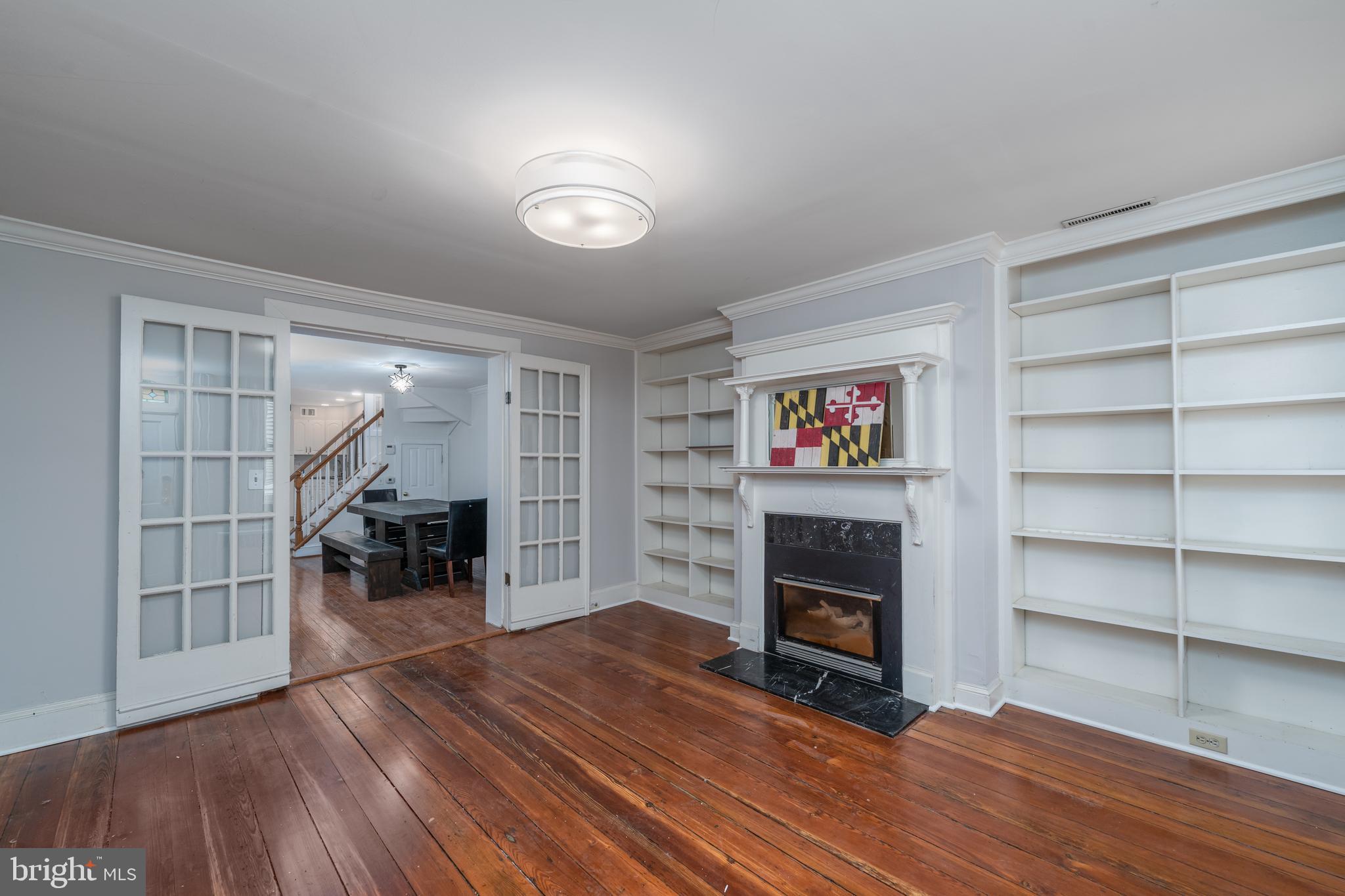 1153 Riverside Avenue Baltimore, MD 21230 - Photo 3 of 35 a view of a livingroom with furniture and a fireplace