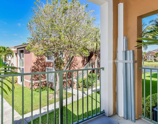 a view of a garden from a corridor