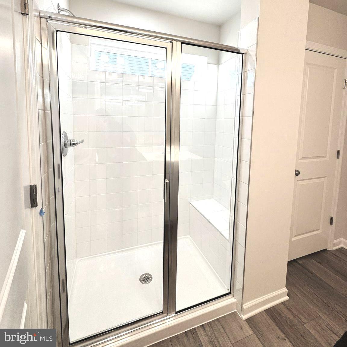 730 R Wilson Loop Georgetown, DE 19947 - Photo 12 of 24 a bathroom with a glass shower door