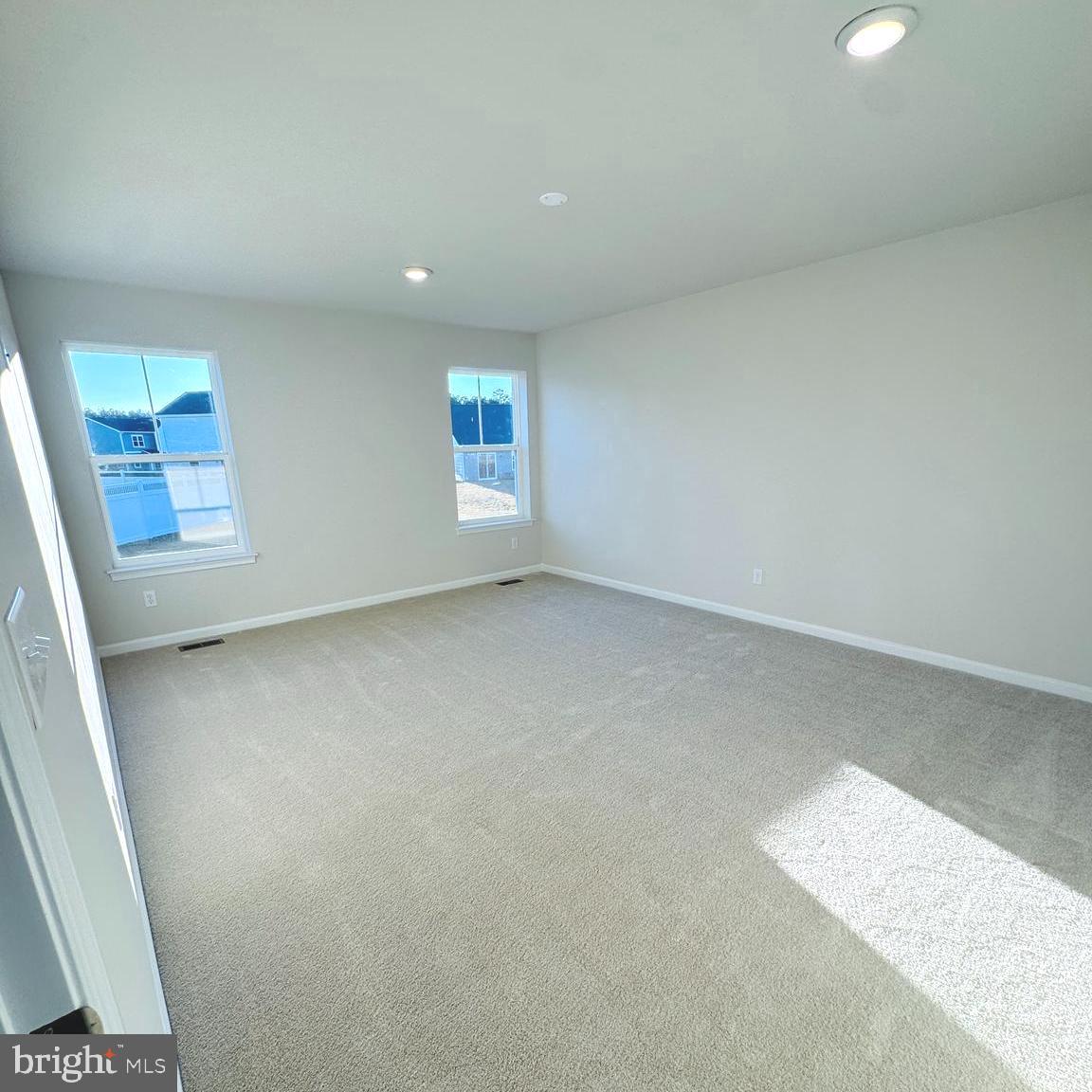 730 R Wilson Loop Georgetown, DE 19947 - Photo 10 of 24 an empty room with windows