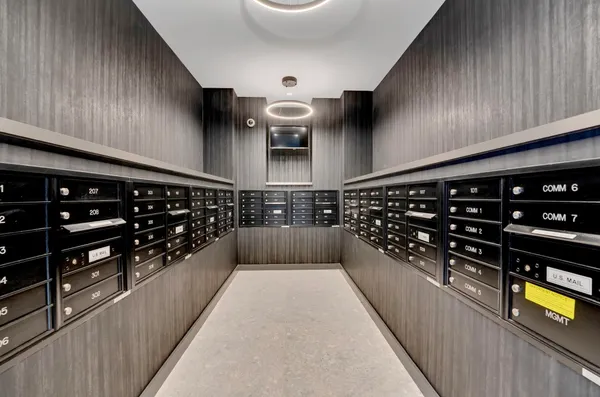 a kitchen with wooden cabinets and a stove
