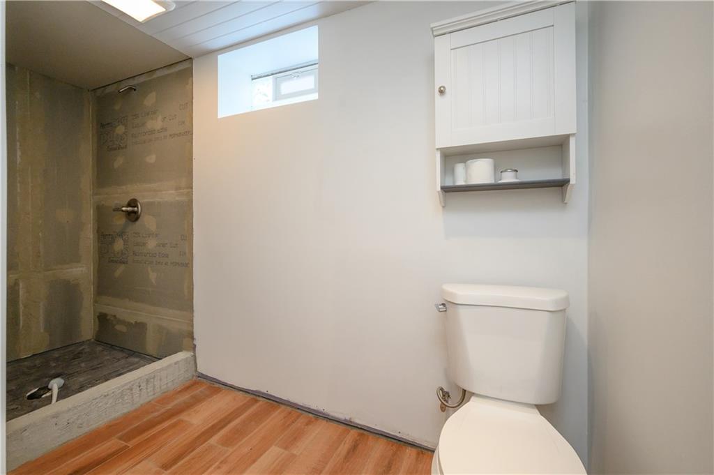 532 Oregon Avenue Rochester, PA 15074 - Photo 19 of 25 a bathroom with a toilet and a shower