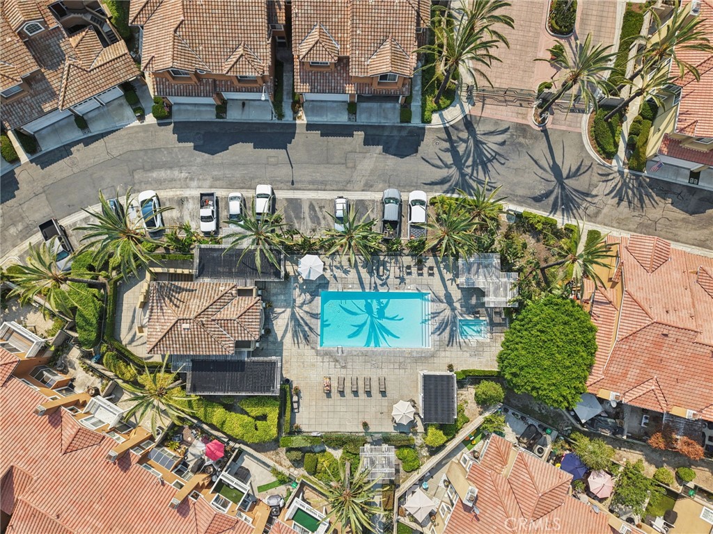 87 Matisse Circle, Unit CI42 Aliso Viejo, CA 92656 - Photo 15 of 19 an aerial view of a house with garden space and street view