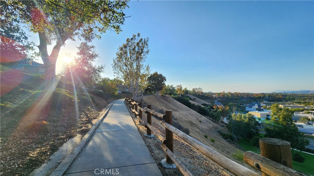 87 Matisse Circle, Unit CI42 Aliso Viejo, CA 92656 - Photo 16 of 19 a view of a house with a yard