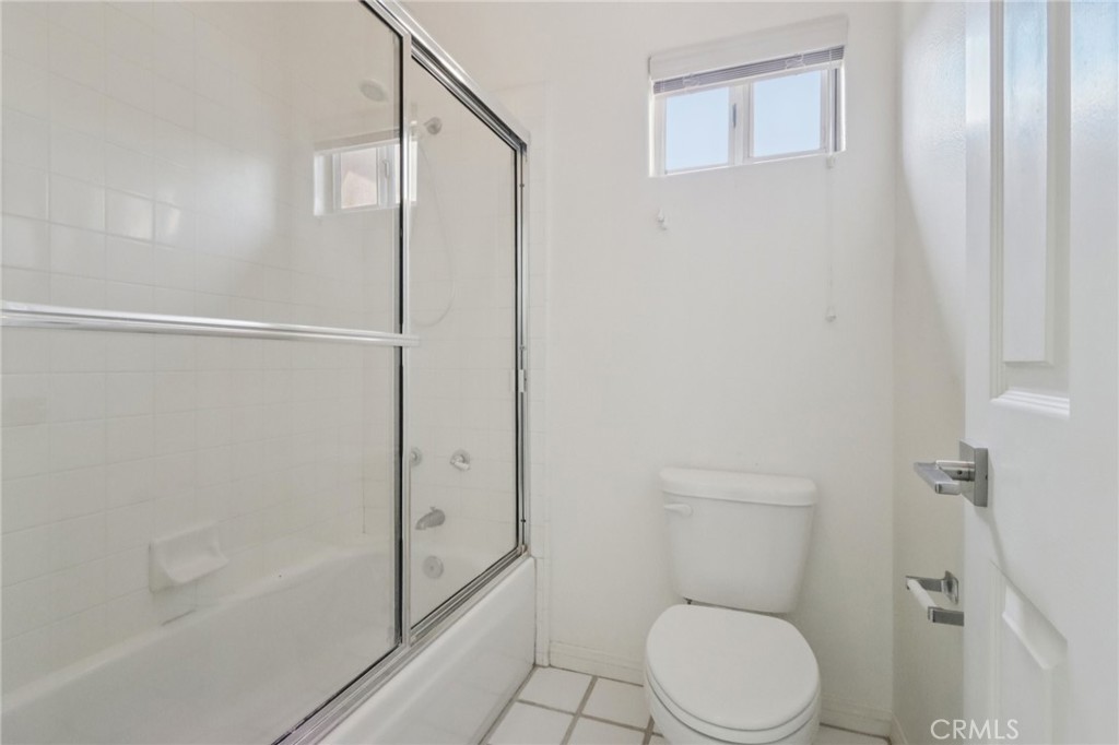 87 Matisse Circle, Unit CI42 Aliso Viejo, CA 92656 - Photo 7 of 19 a bathroom with a toilet and a shower