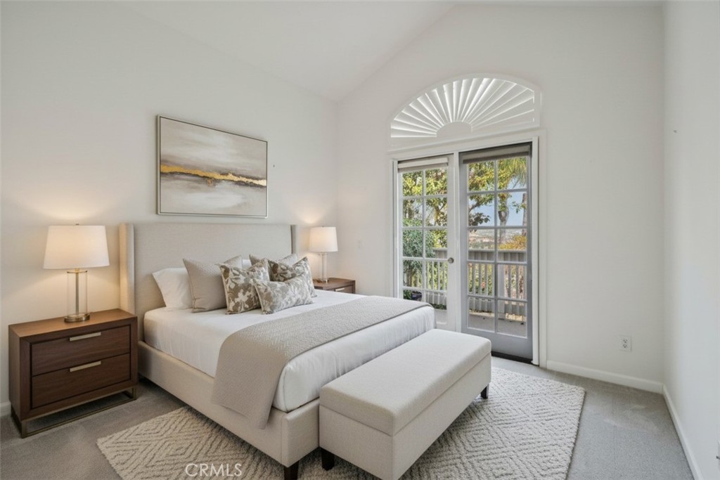 87 Matisse Circle, Unit CI42 Aliso Viejo, CA 92656 - Photo 8 of 19 a bedroom with a bed and a window