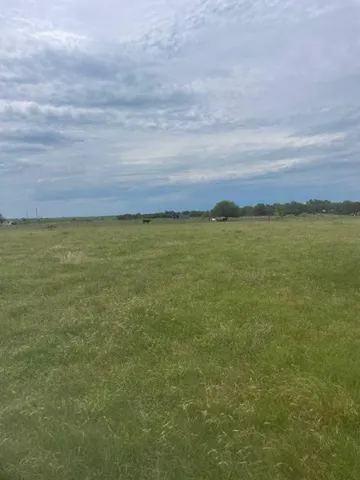 a view of an ocean and mountain