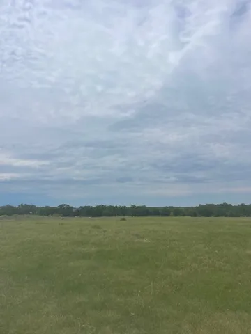 a view of an ocean and mountain