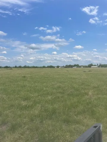 a view of a lake and a yard