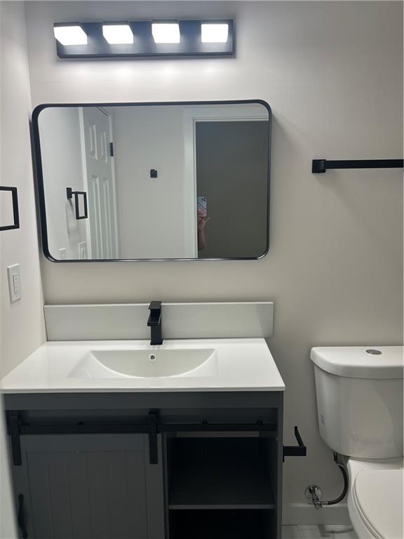 3715 Cress Way Drive Decatur, GA 30034 - Photo 21 of 37 a bathroom with a sink toilet and mirror