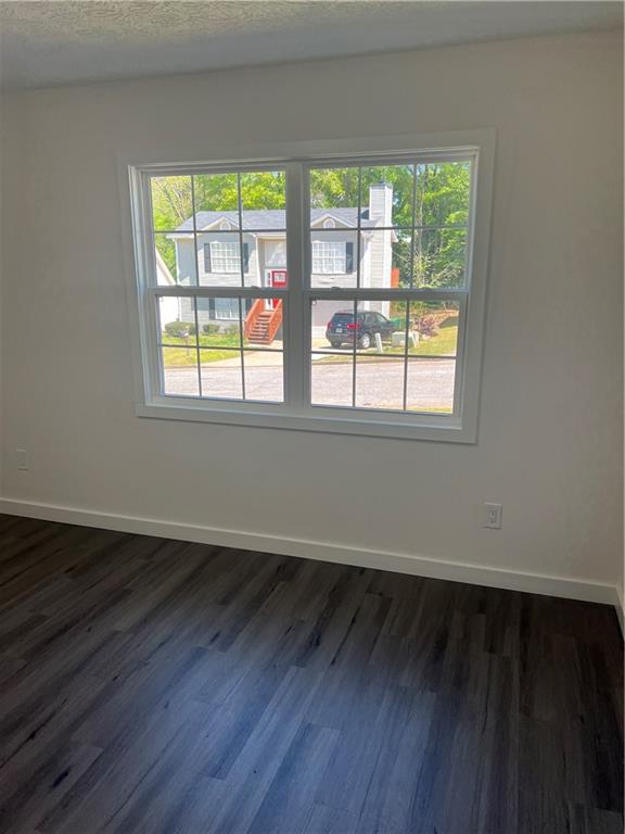 3715 Cress Way Drive Decatur, GA 30034 - Photo 28 of 37 an empty room with wooden floor and windows