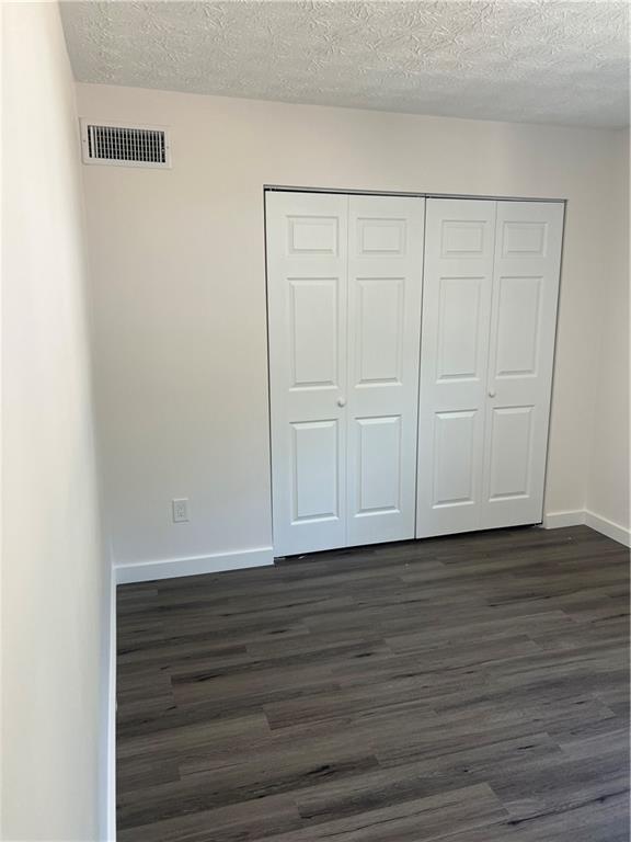 3715 Cress Way Drive Decatur, GA 30034 - Photo 29 of 37 a view of an empty room with wooden floor