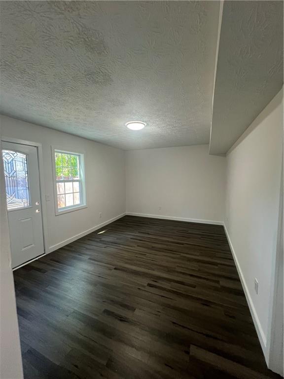 3715 Cress Way Drive Decatur, GA 30034 - Photo 31 of 37 a view of an empty room with wooden floor and a window
