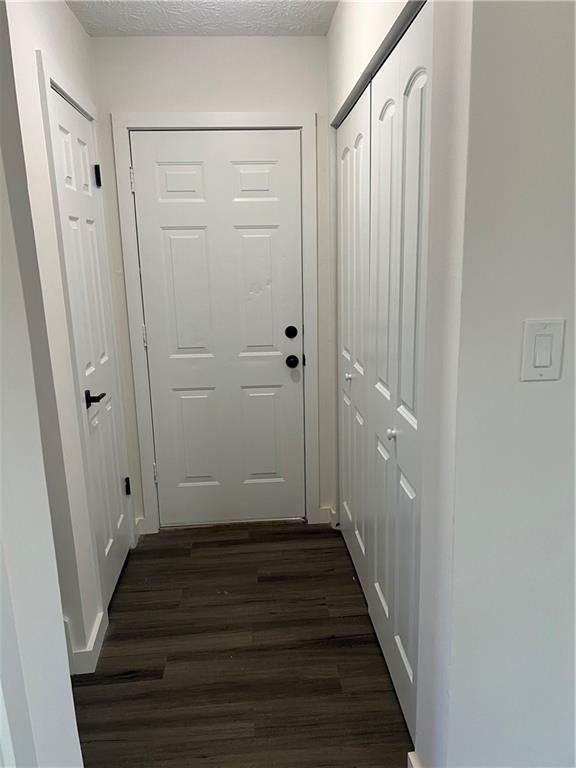 3715 Cress Way Drive Decatur, GA 30034 - Photo 36 of 37 a view of a hallway with wooden floor and staircase