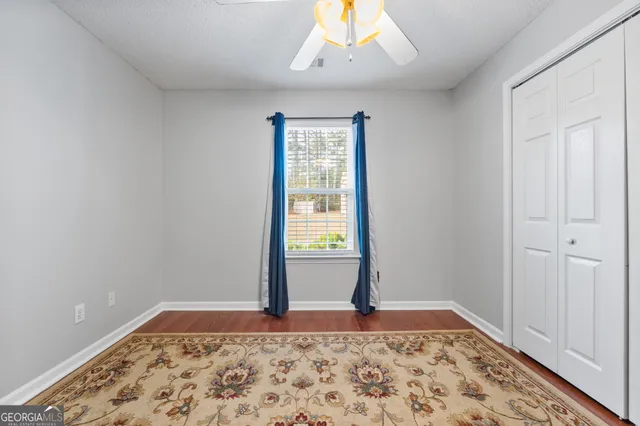 a view of an empty room and window