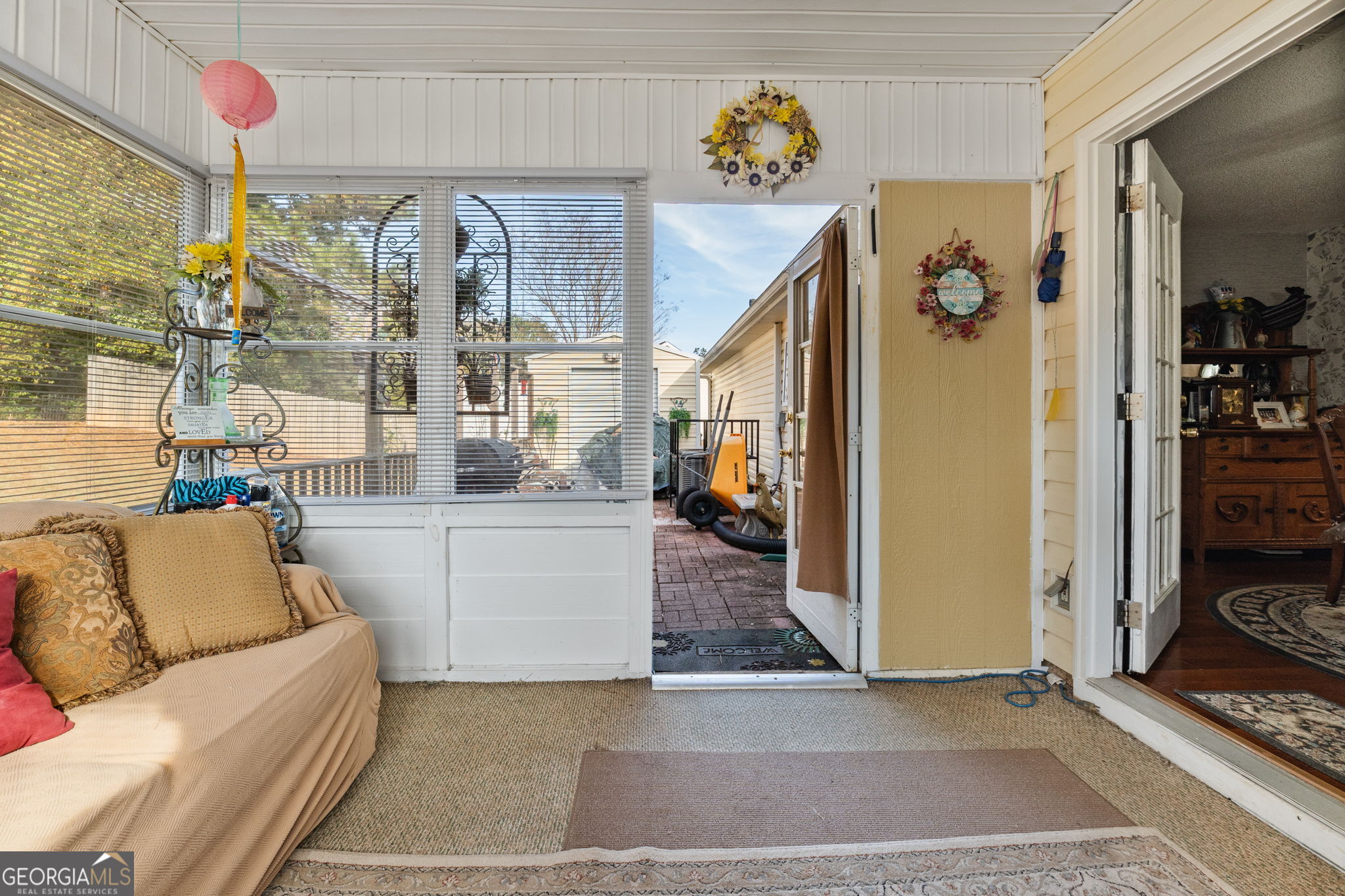 291 Regal Road Jackson, GA 30233 - Photo 23 of 35 a living room with furniture and a floor to kitchen