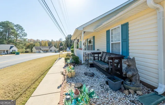 a view of a swimming pool with a lounge chairs
