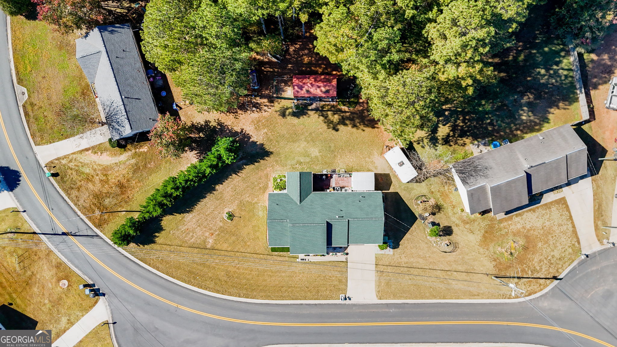 291 Regal Road Jackson, GA 30233 - Photo 33 of 35 an aerial view of a house with swimming pool