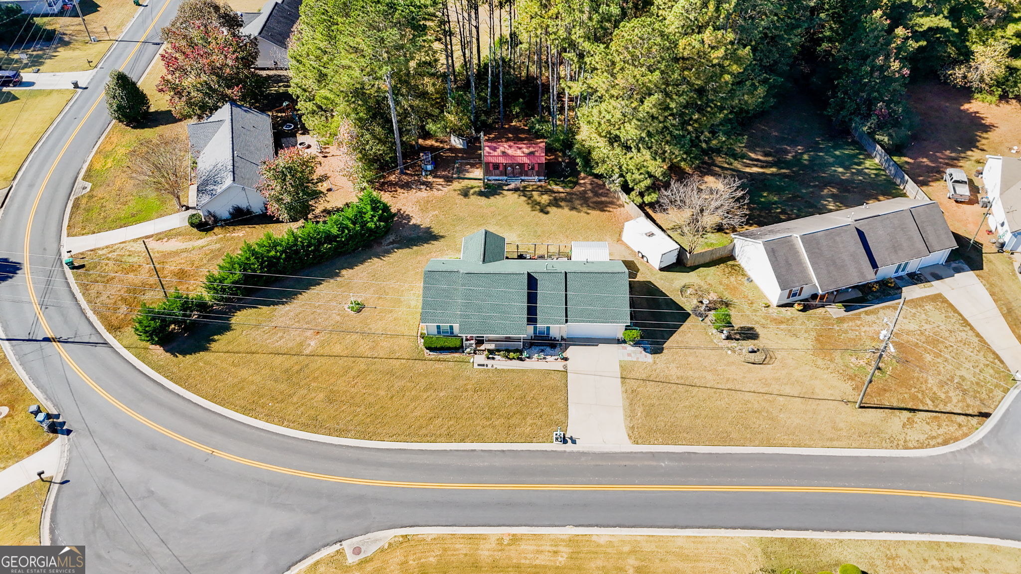 291 Regal Road Jackson, GA 30233 - Photo 35 of 35 an aerial view of a house with swimming pool