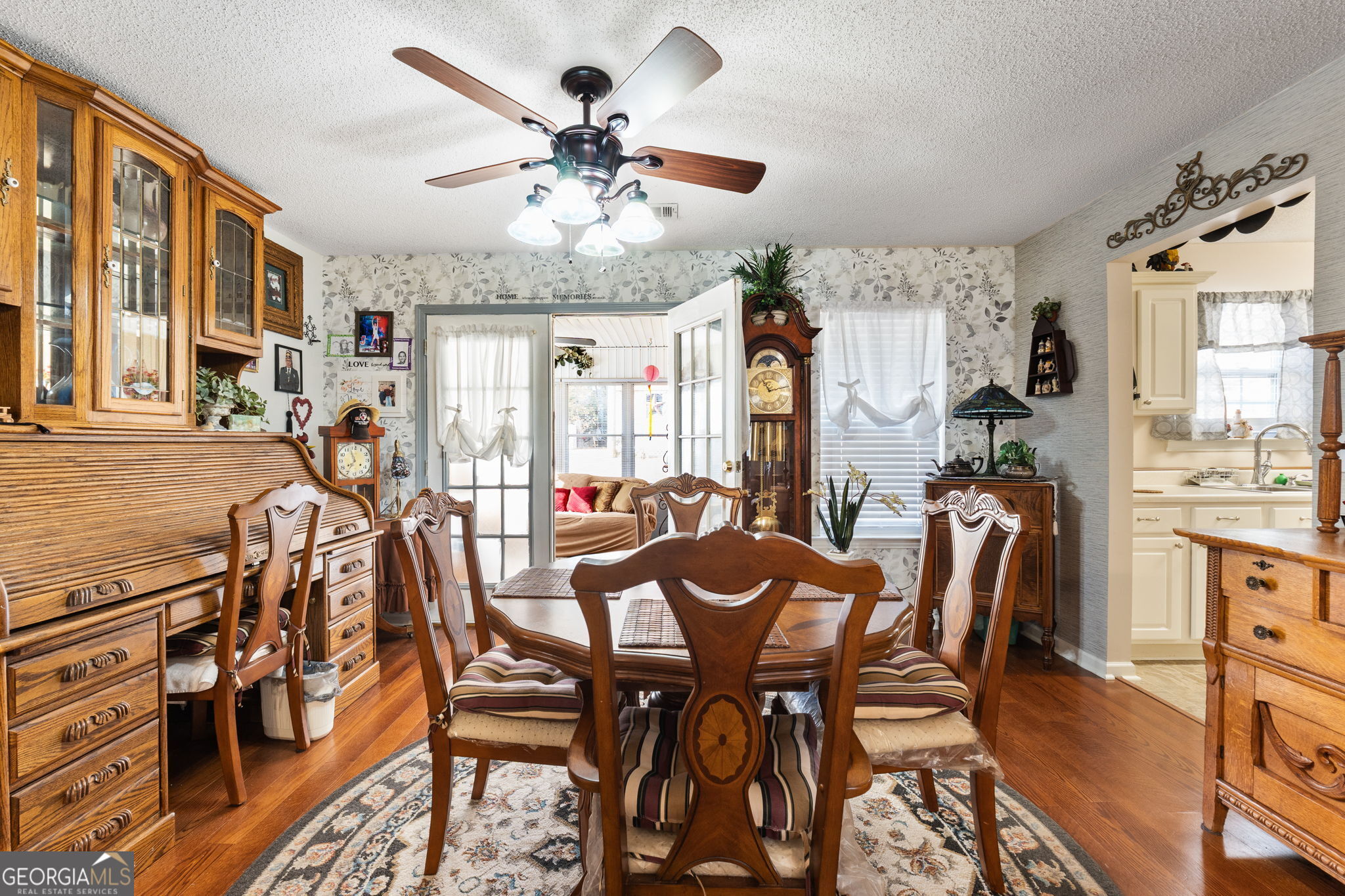 291 Regal Road Jackson, GA 30233 - Photo 5 of 35 a view of a dining room with furniture window and wooden floor
