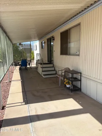 a view of balcony with patio