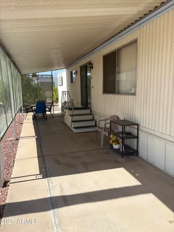 a view of balcony with patio
