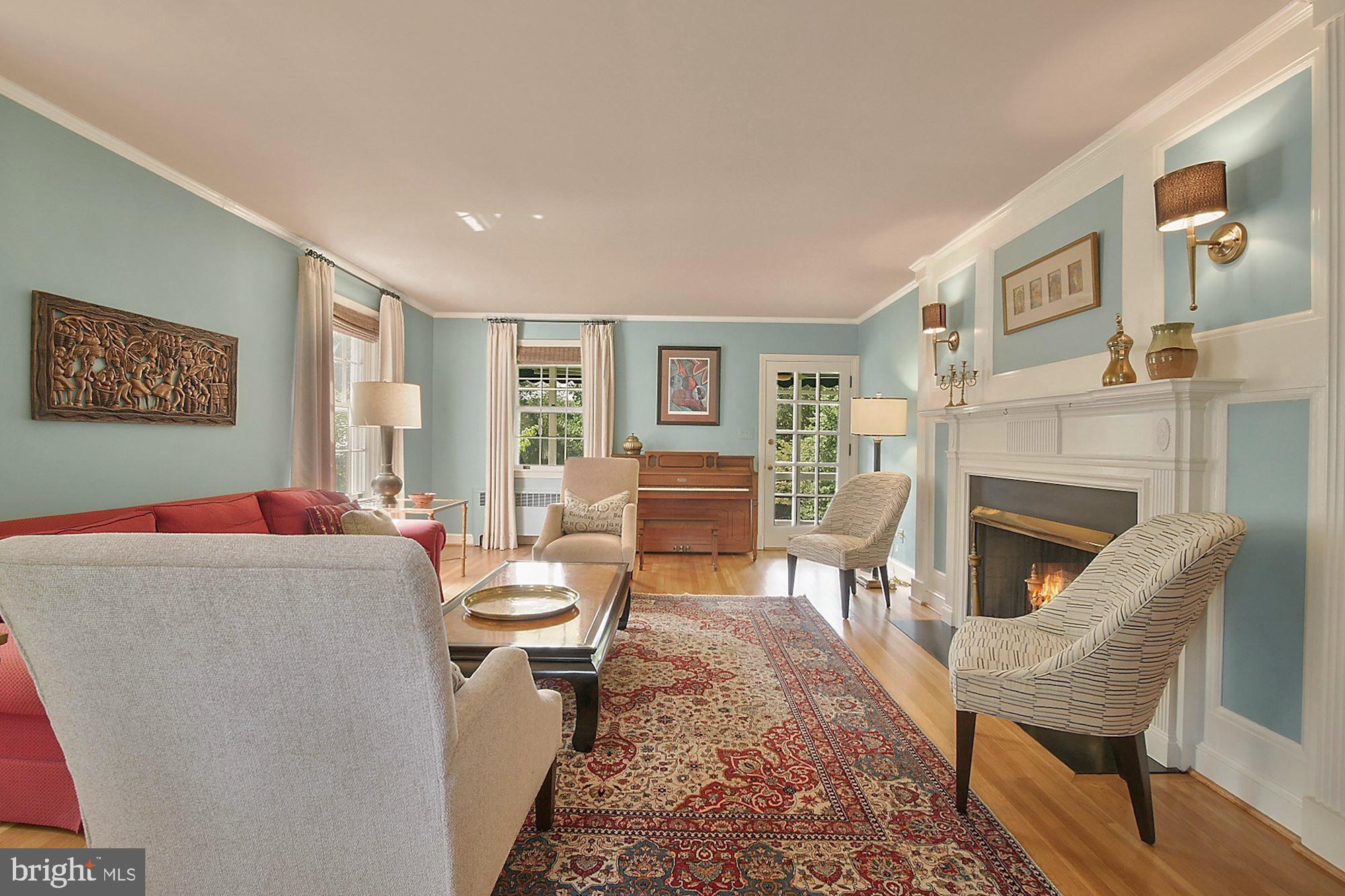 100 Warrenton Drive Silver Spring, MD 20904 - Photo 6 of 36 Living room with French door to large screen porch