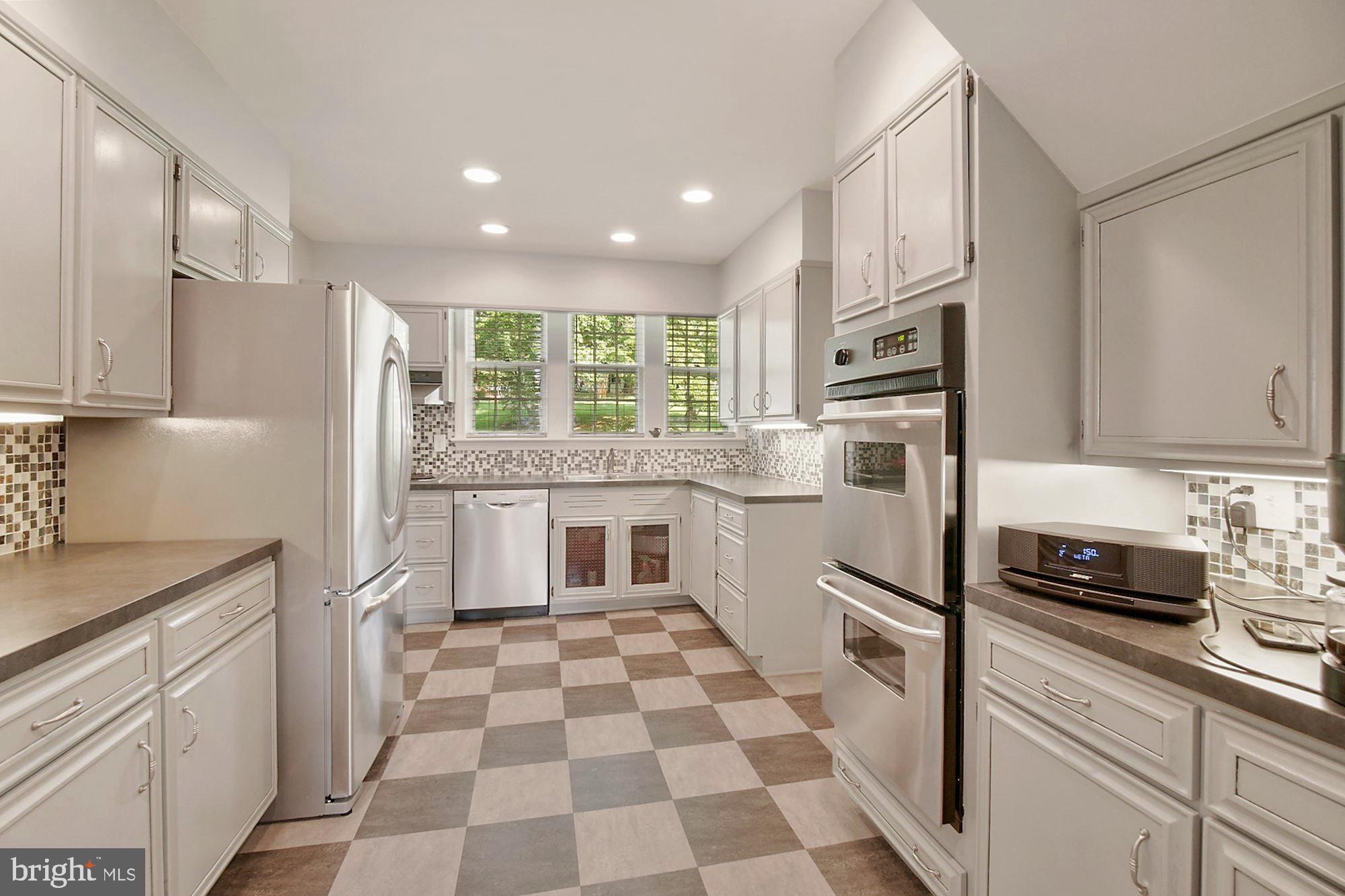 100 Warrenton Drive Silver Spring, MD 20904 - Photo 10 of 36 Kitchen sink under windows, lovely view