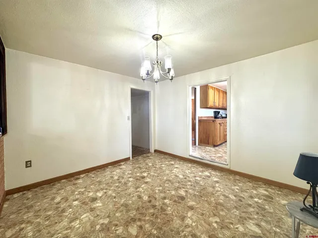 a view of a livingroom with a chandelier