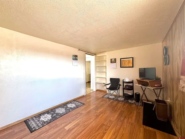 a workspace with wooden floor