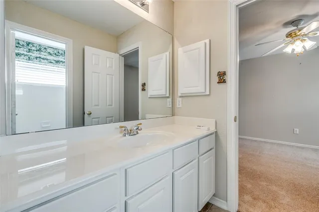 a view of a house with yard and tree s