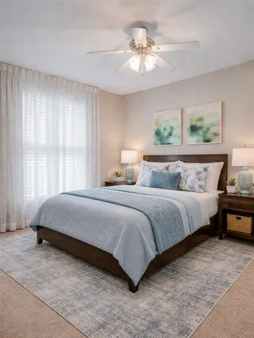 a view of a yard in front of a house with large tree