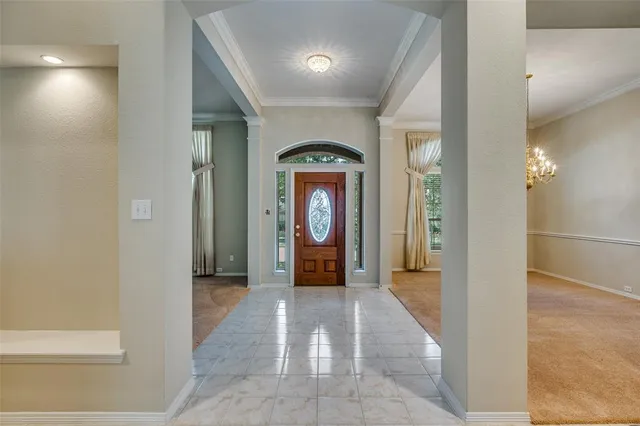 a living room with furniture and a couch