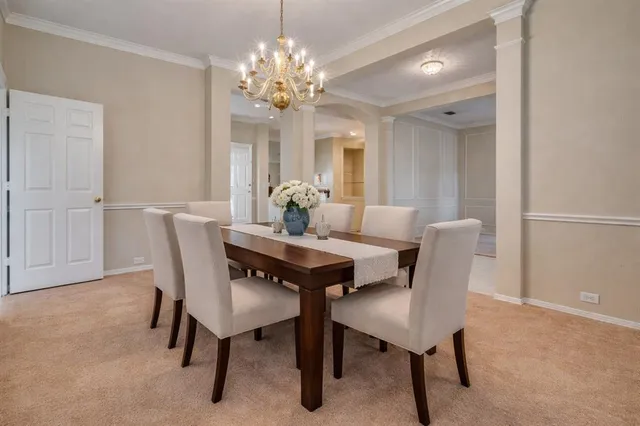 a living room with furniture fireplace and flat screen tv