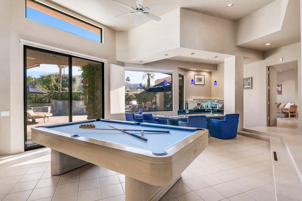45625 Apache Road Indian Wells, CA 92210 - Photo 17 of 33 a room with pool table and windows