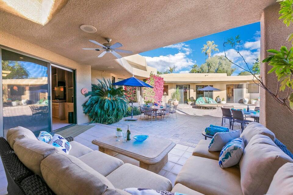 45625 Apache Road Indian Wells, CA 92210 - Photo 32 of 33 a living room with furniture and a large window