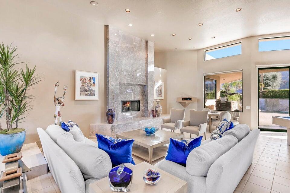 45625 Apache Road Indian Wells, CA 92210 - Photo 4 of 33 a living room with furniture and a fireplace