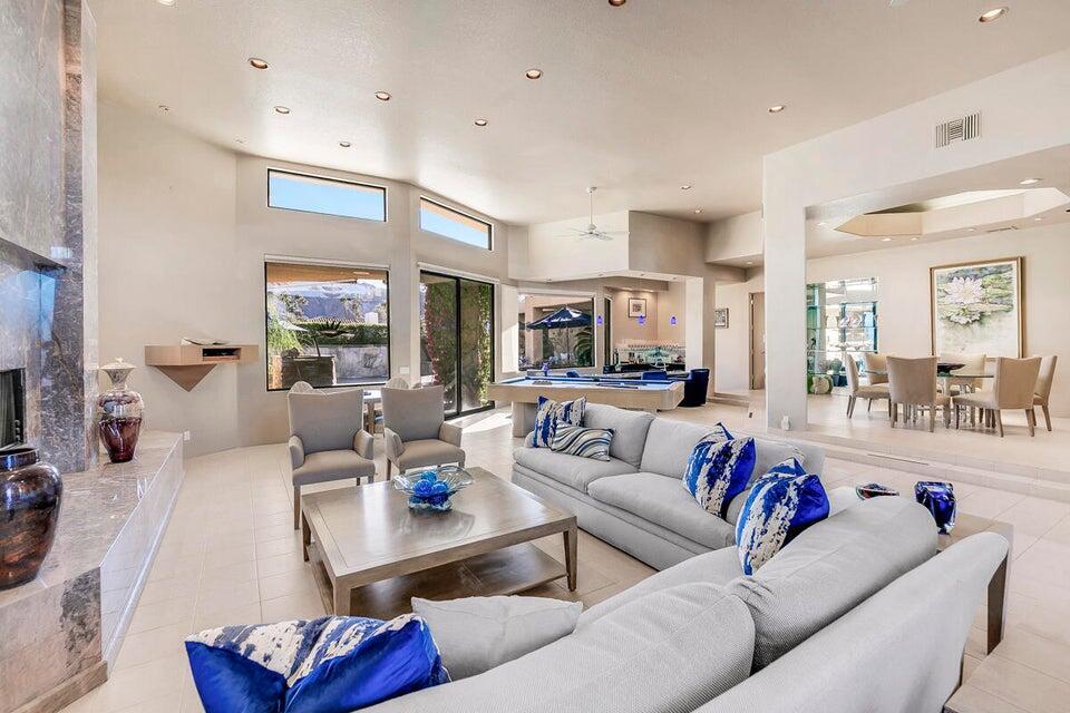 45625 Apache Road Indian Wells, CA 92210 - Photo 5 of 33 a living room with furniture and a large window