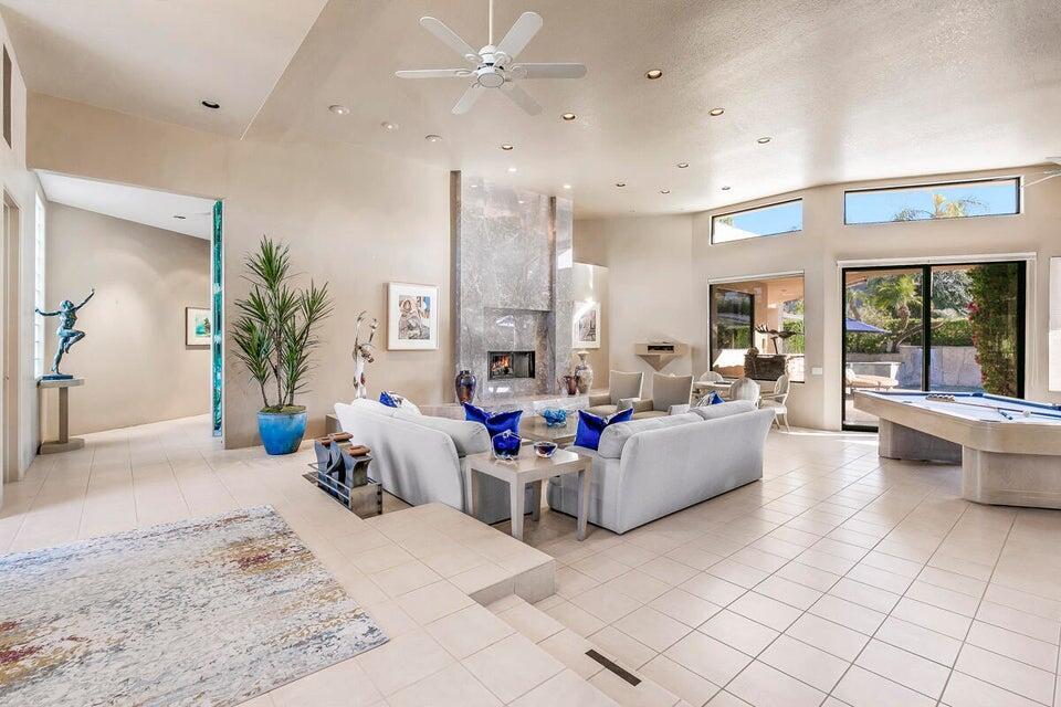 45625 Apache Road Indian Wells, CA 92210 - Photo 7 of 33 a living room with furniture and a large window
