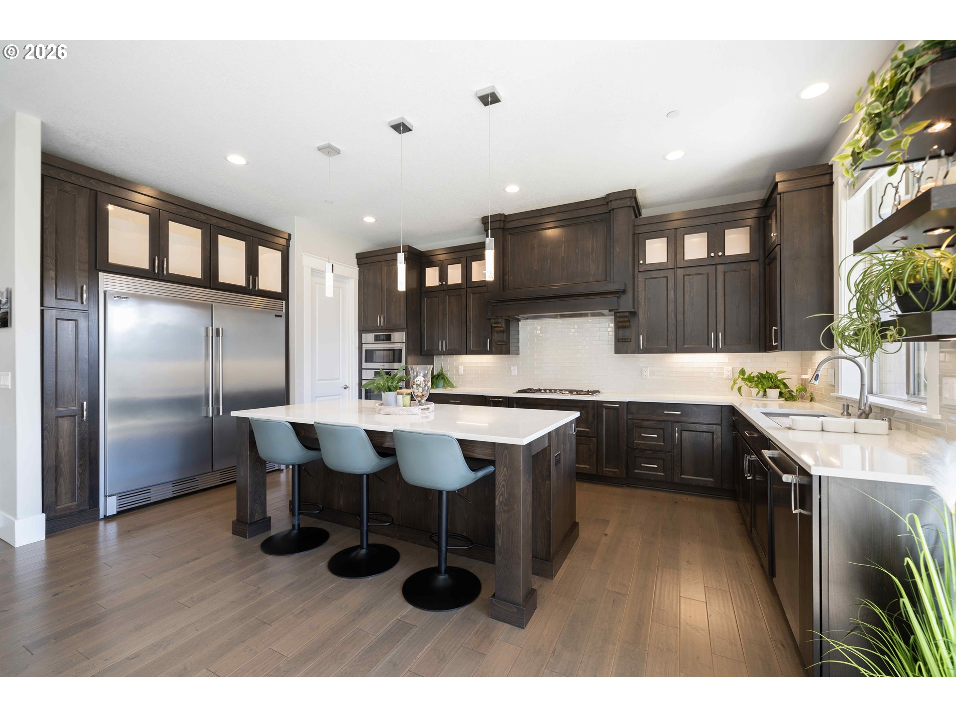 2036 Northwest 44th Avenue Camas, WA 98607 - Photo 14 of 48 a kitchen with a sink appliances and cabinets