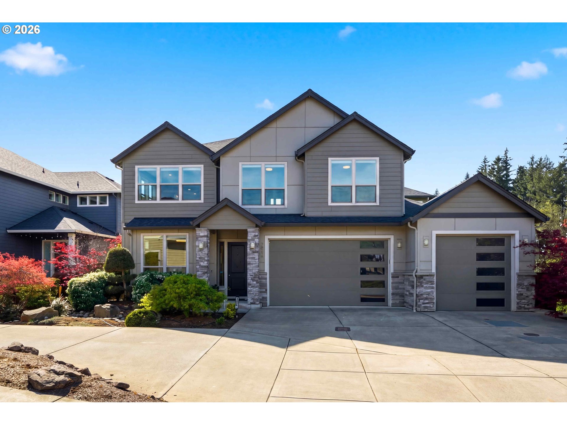 2036 Northwest 44th Avenue Camas, WA 98607 - Photo 2 of 48 a front view of a house with a yard