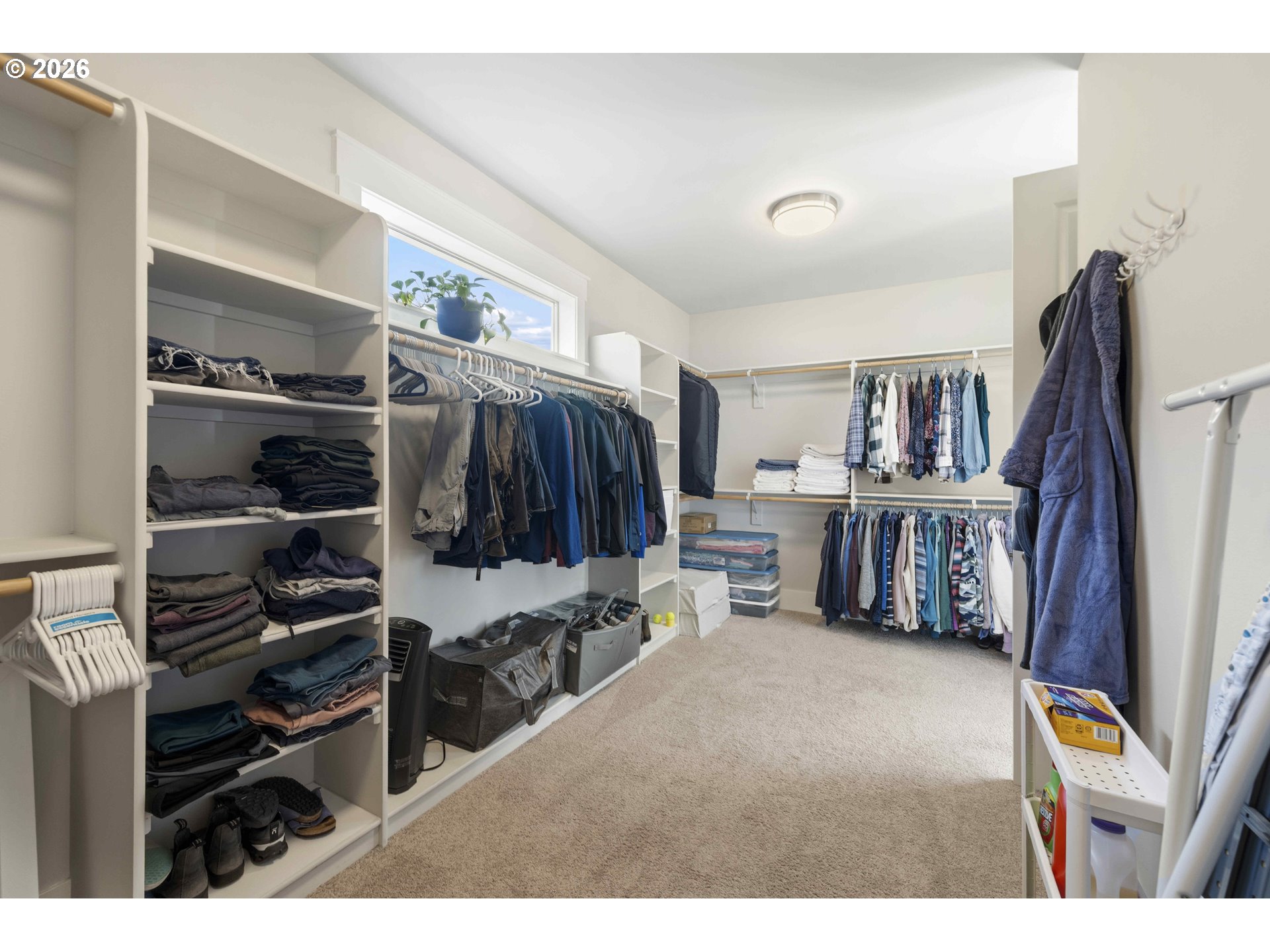 2036 Northwest 44th Avenue Camas, WA 98607 - Photo 25 of 48 a view of walk in closet with clothes and shoes