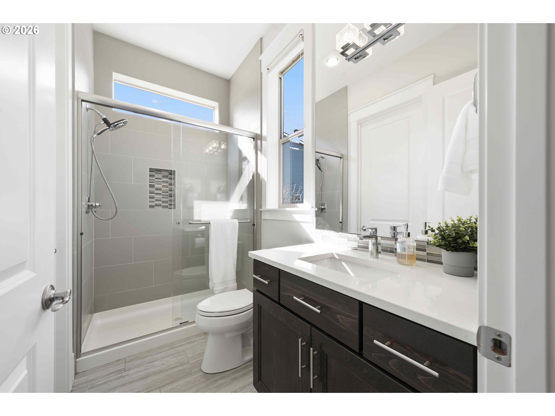 2036 Northwest 44th Avenue Camas, WA 98607 - Photo 28 of 48 a bathroom with a sink a toilet and shower