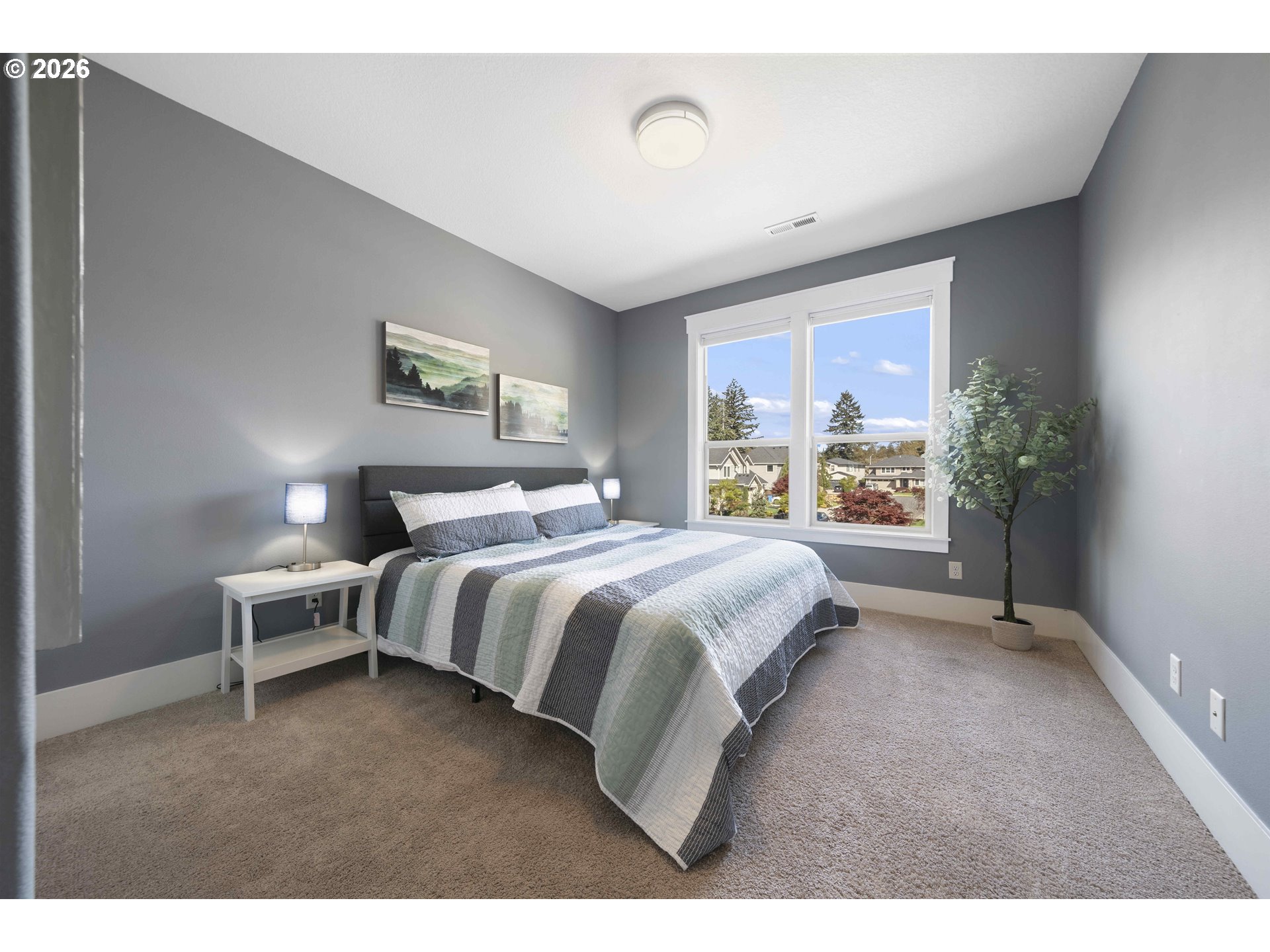 2036 Northwest 44th Avenue Camas, WA 98607 - Photo 30 of 48 a spacious bedroom with a bed and a window