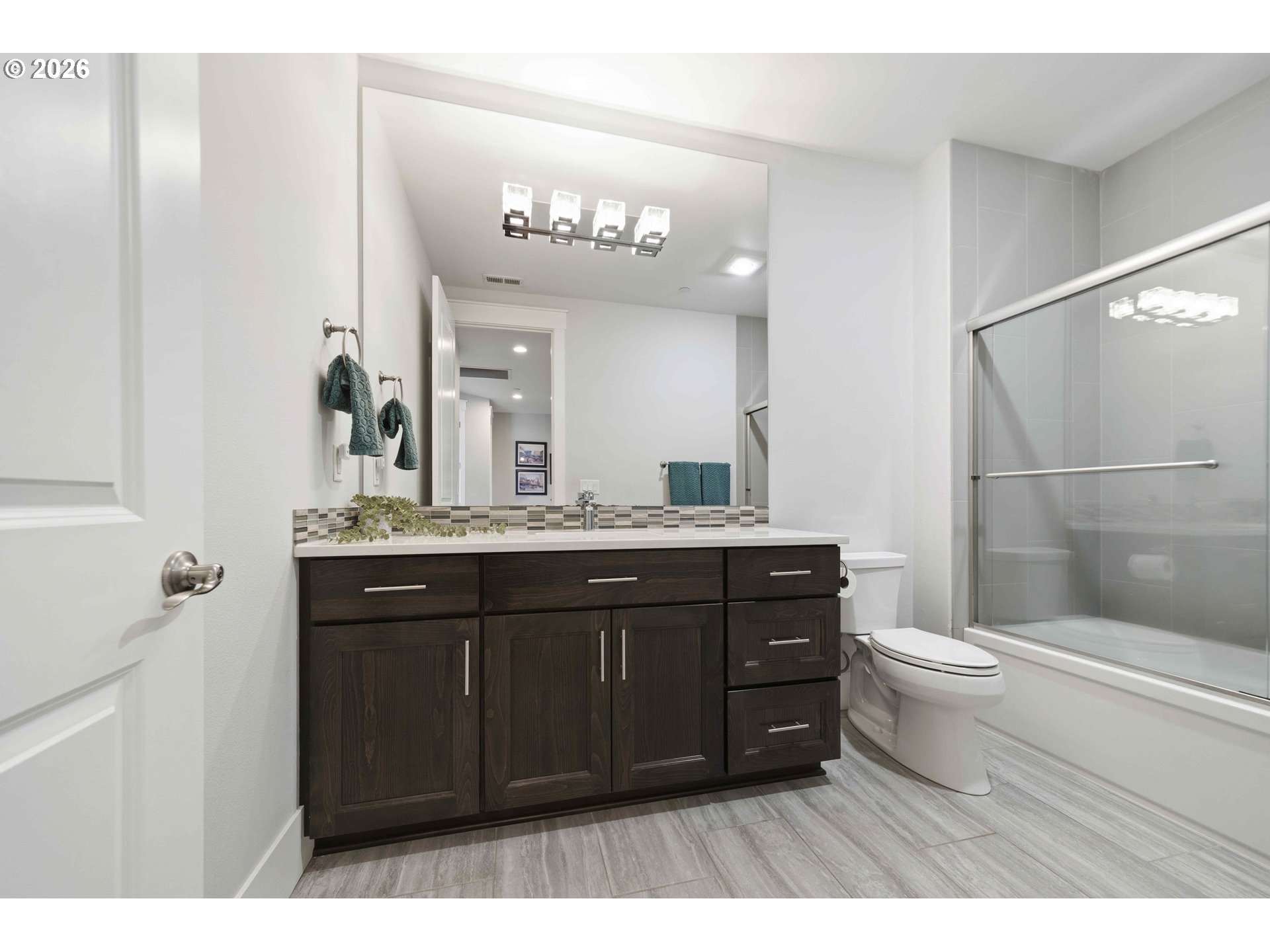2036 Northwest 44th Avenue Camas, WA 98607 - Photo 31 of 48 a bathroom with a toilet a sink and a mirror