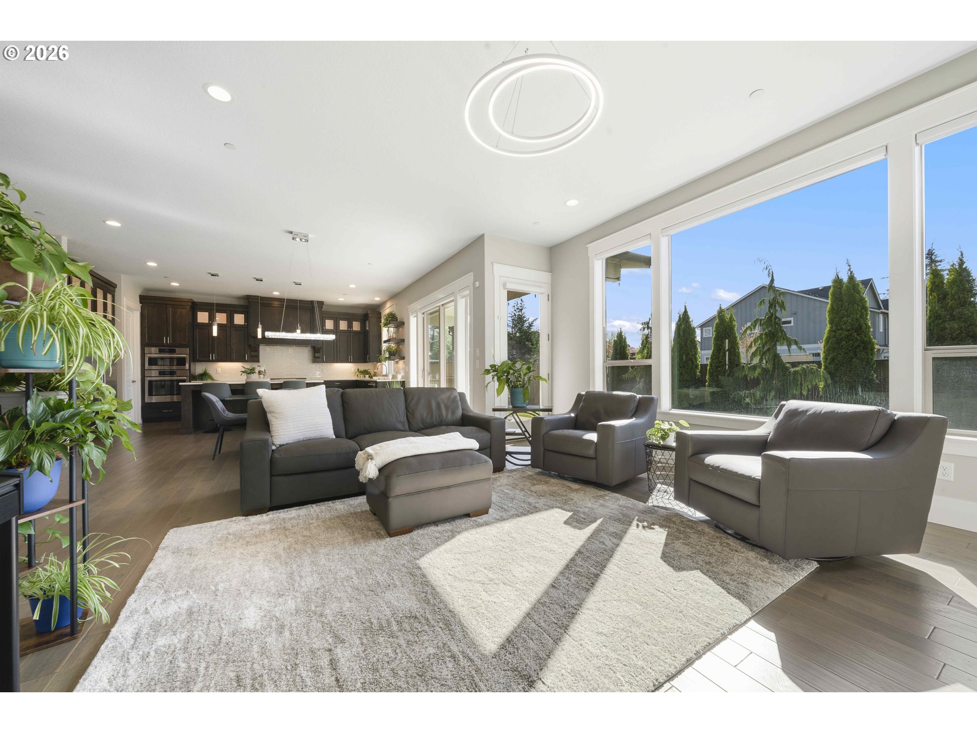 2036 Northwest 44th Avenue Camas, WA 98607 - Photo 8 of 48 a living room with furniture and a large window
