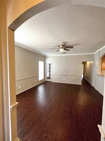 a view of a livingroom with wooden floor
