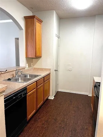 a bathroom with a sink a mirror and a shower