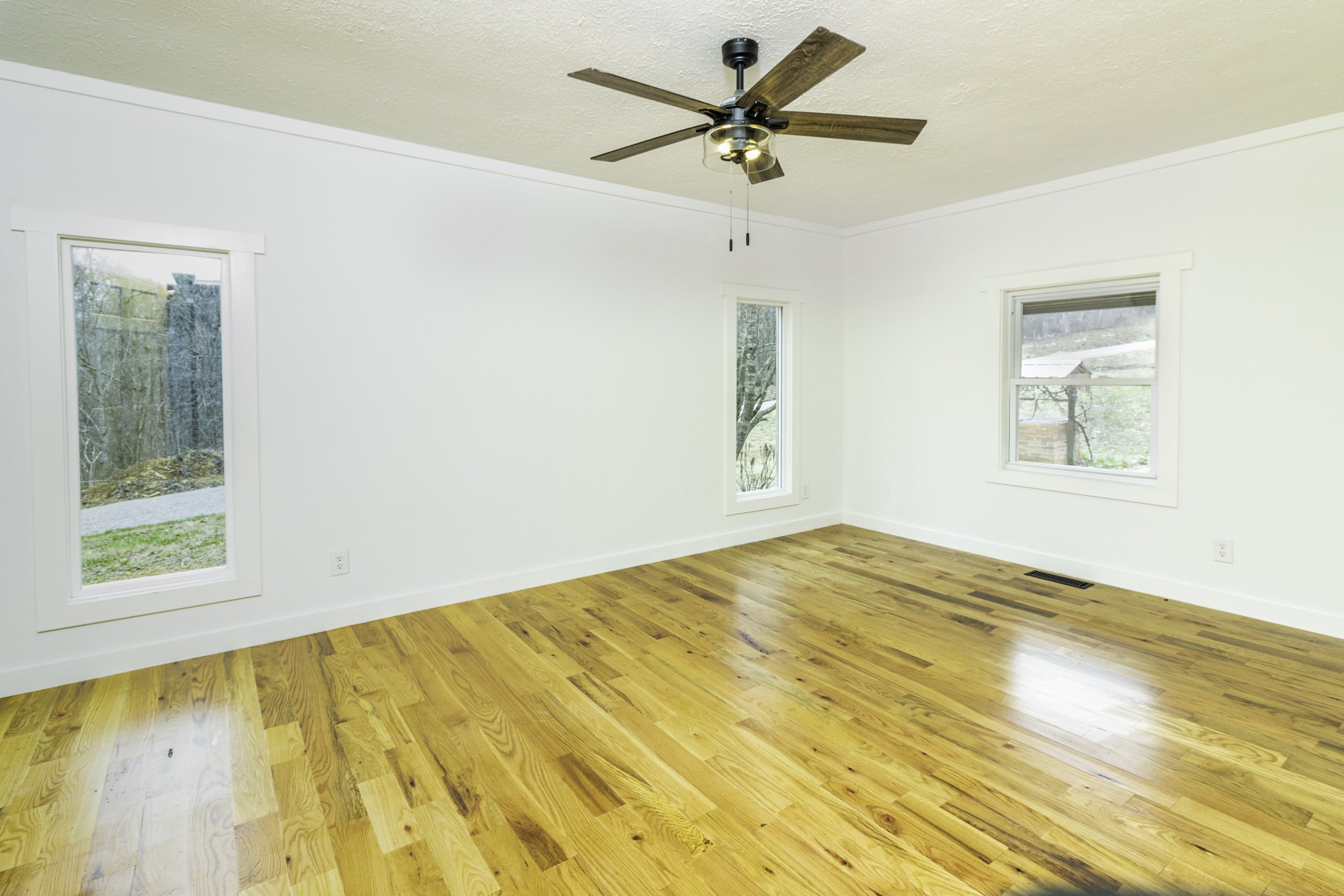 405 Napier Lake Road Hohenwald, TN 38462 - Photo 21 of 26 a view of an empty room and a window
